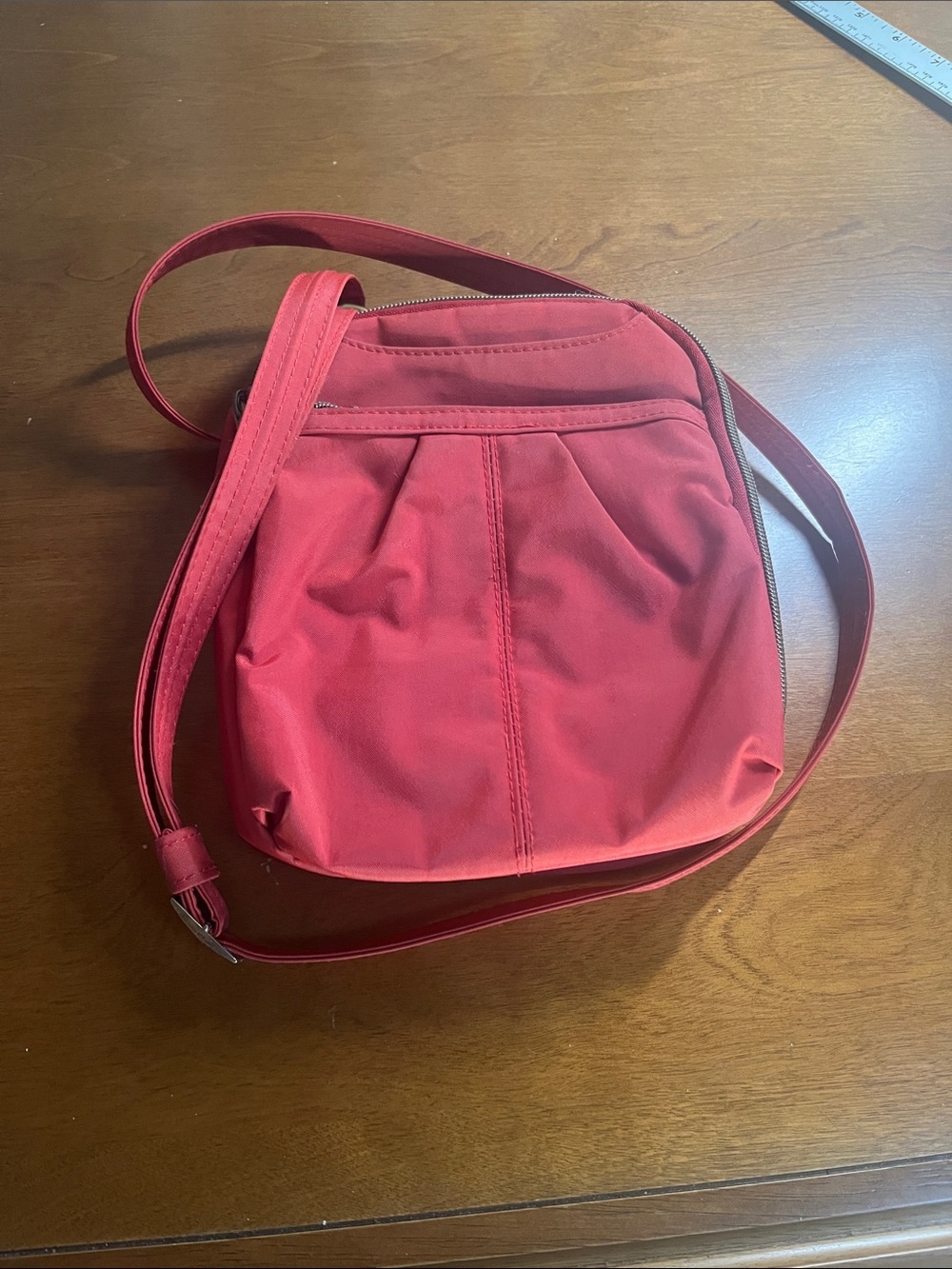 Travelon Rust Crossbody Bag with Front Pleat Detail